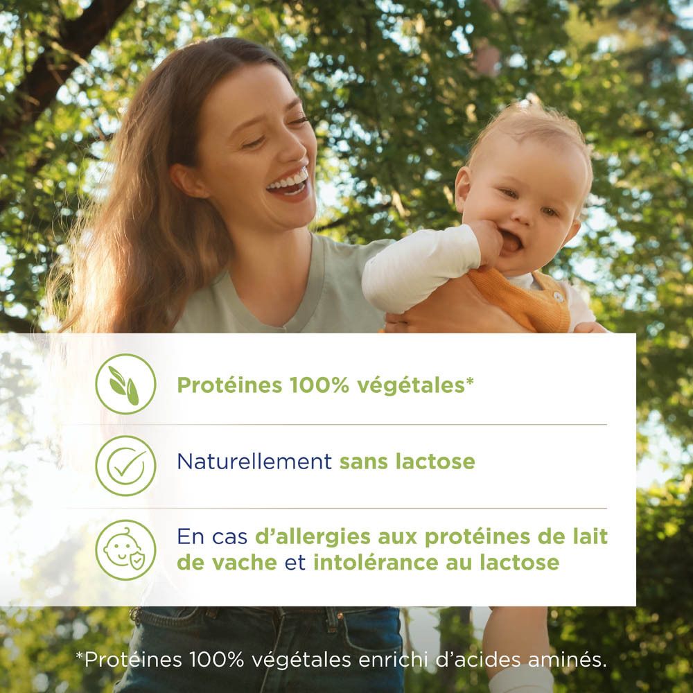 Lait infantile Nutrilon Rice Pro en boîte, près d'un biberon. Pour bébés de 0-36 mois.
