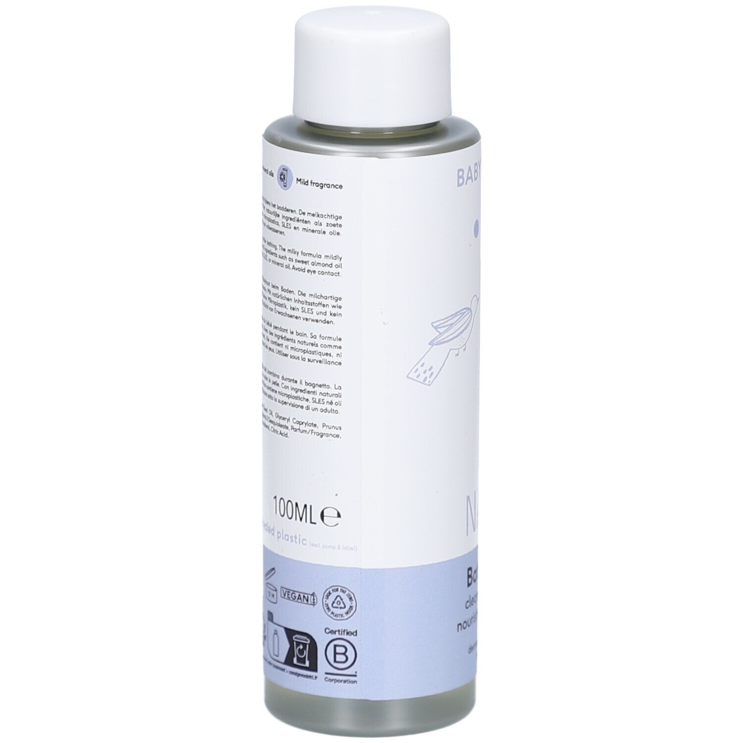 Dos du flacon d'huile de bain Naïf. Texte en plusieurs langues. Contient 100ml. Fabriqué à partir de plastique recyclé. Certification B Corp.