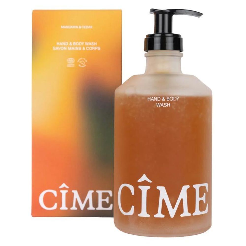 Savon pour les mains et le corps Cîme en flacon verre avec pompe. Liquide orangé.