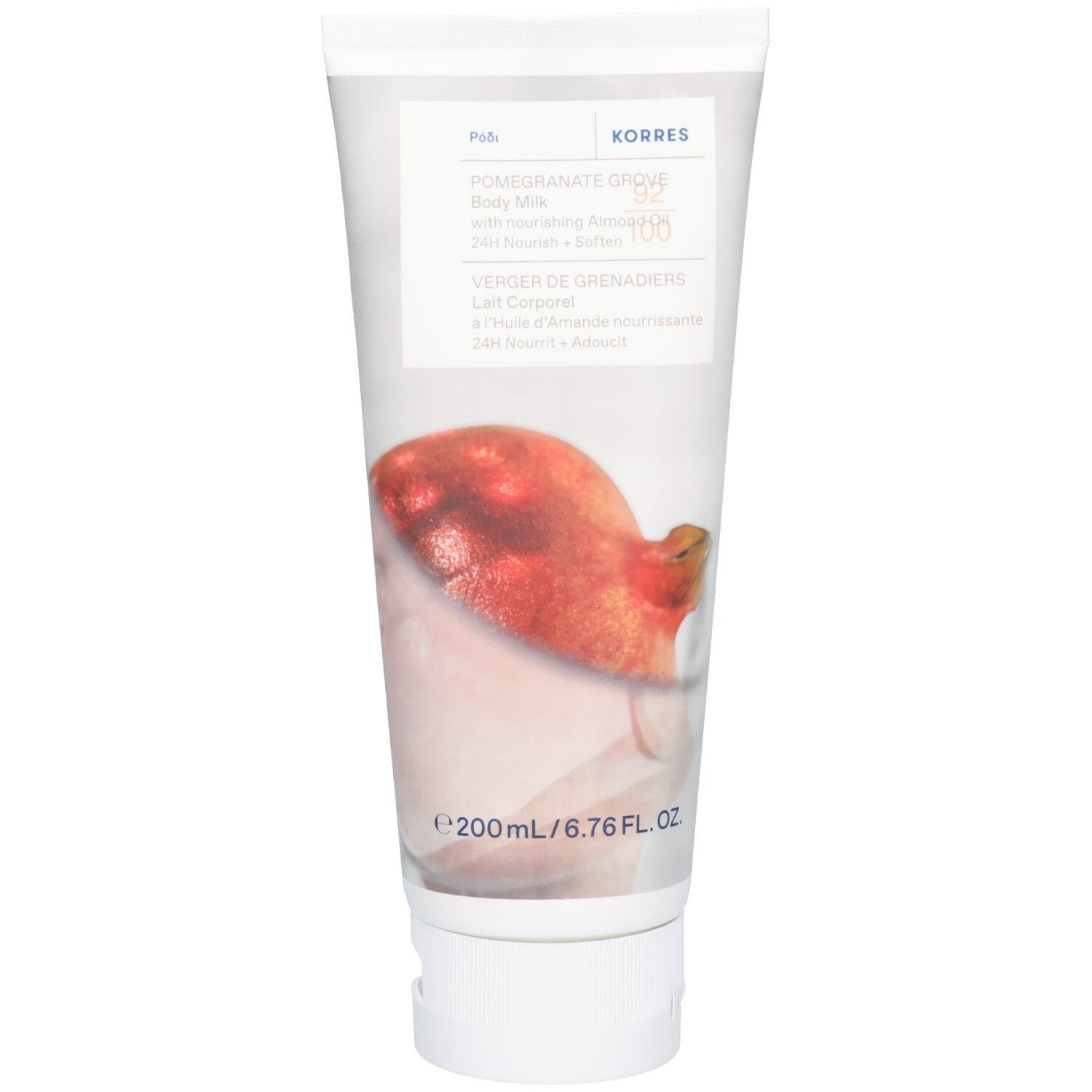 Tube blanche avec inscription Korres Pomegranate Grove Body Milk et illustration de grenade.