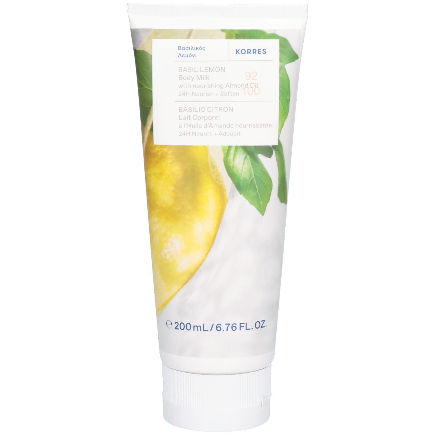 Witte en groene tube. Opschrift: Korres, Basil Lemon Body Milk. Illustratie van citroen en basilicumbladeren. Onderaan: 200ml/6.76 FL. OZ.