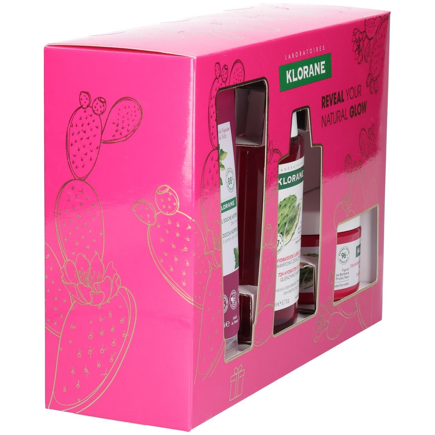 Roze Klorane cadeauverpakking met drie producten. Douchegel, shampoo en crème zichtbaar. Cactus design en gouden details.
