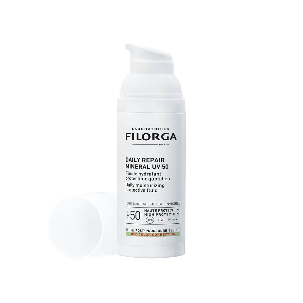 Witte fles met doseerpomp. Opschrift: Filorga, Daily Repair Mineral UV 50, SPF 50+.