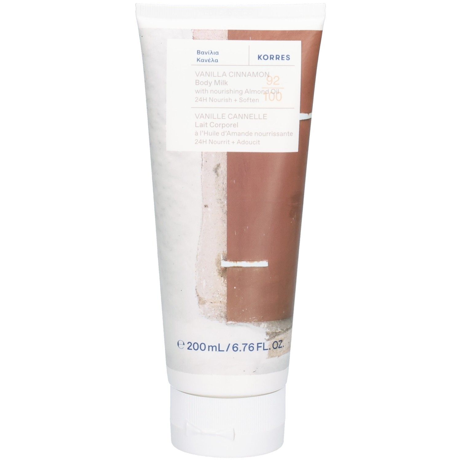 Tube de lait corporel Korres Kb Vanille Cannelle. Corps blanc avec section marron. Informations produit et logo de la marque.