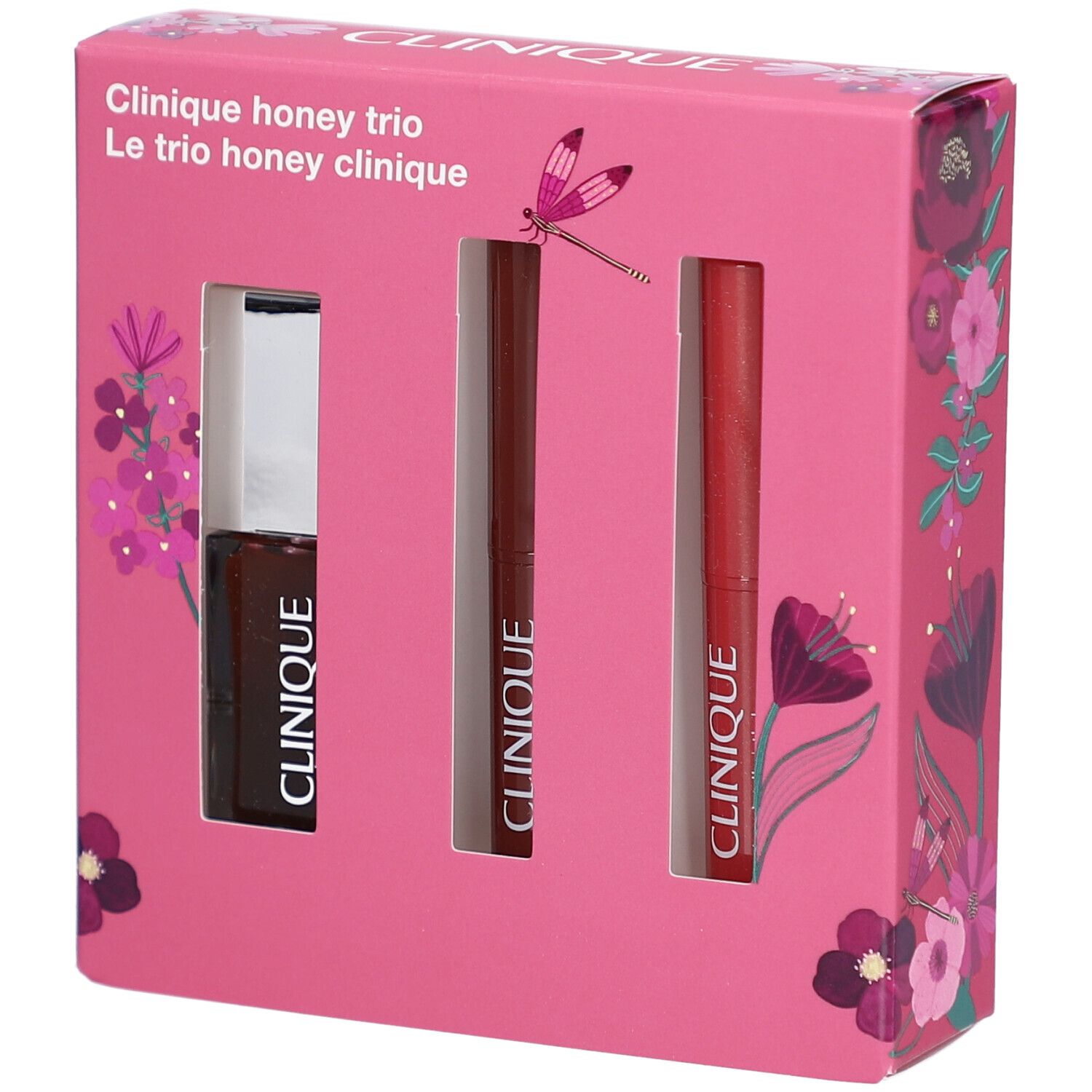 Roze geschenkverpakking met drie cosmetica producten. De verpakking toont de tekst "Clinique honey trio". Producten: lipgloss en twee lippenstiften.