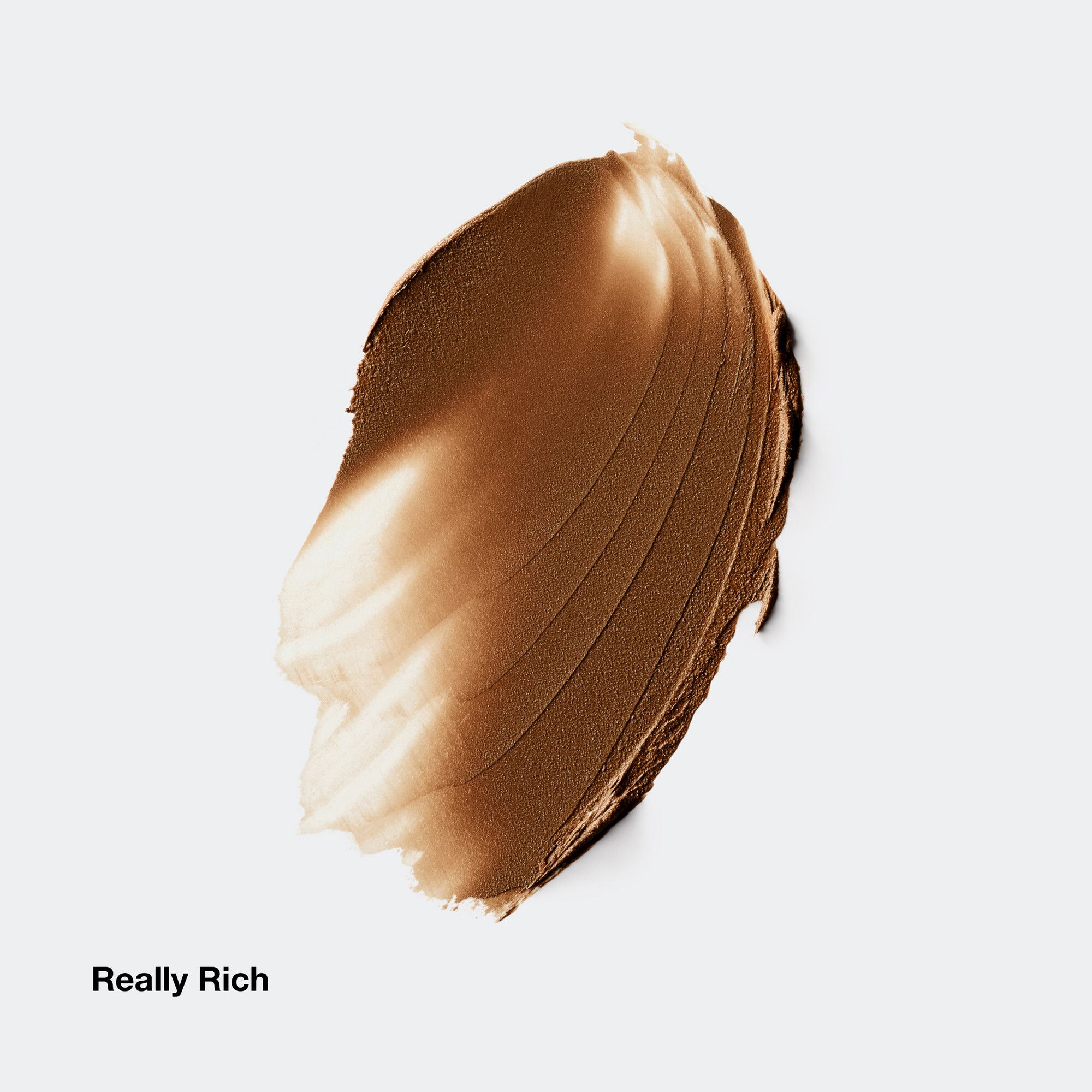 Bruine tint van Clinique Chubby Stick. Productnaam en tint 'Really Rich' zichtbaar.