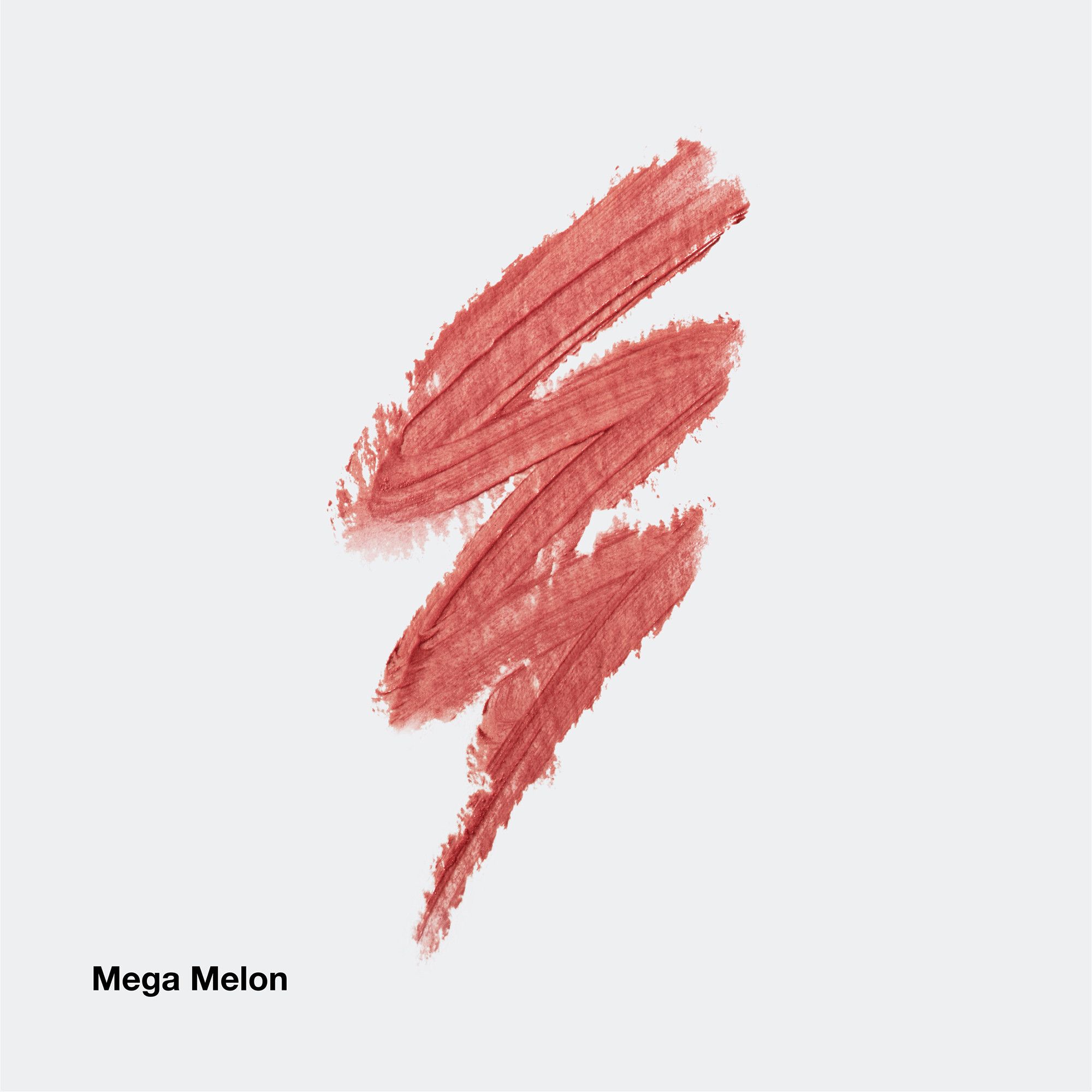 Trois traits de rouge à lèvres, couleur Mega Melon. Inscription Mega Melon.