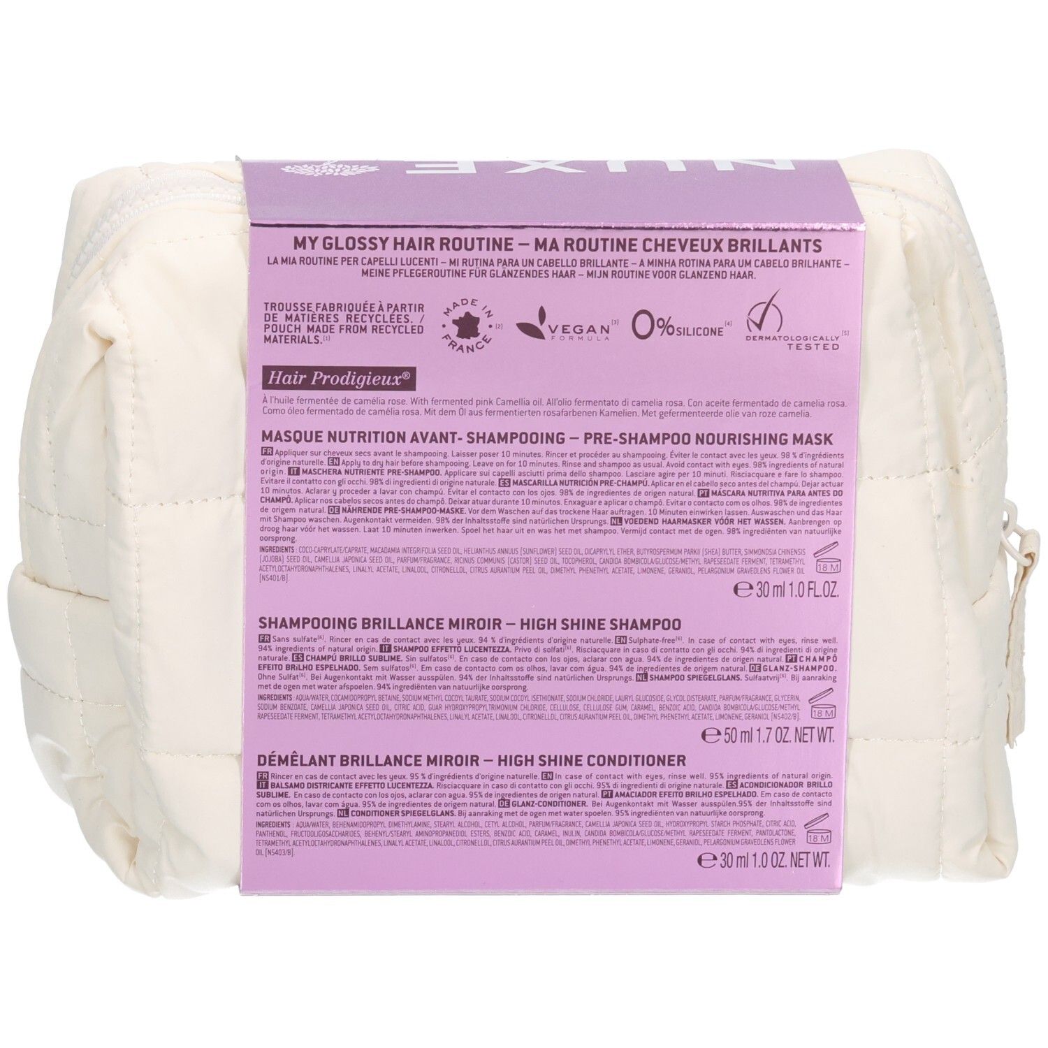 Achterkant van de toilettas met Nuxe Hair Prodigieux set. Bevat productinformatie en tekst: "Vegan", "0% Silicone".