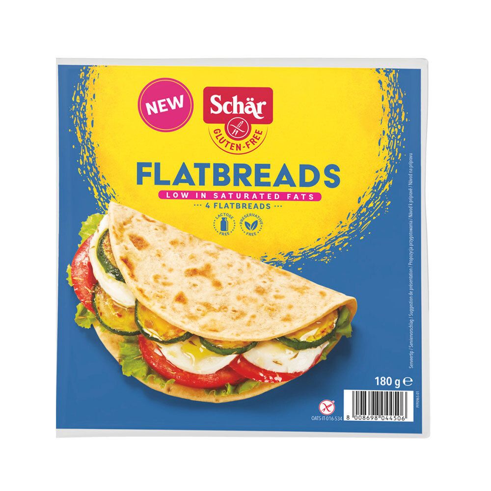 Verpakking Schär flatbreads. Glutenvrij. Gevulde flatbread zichtbaar. Blauwe en gele verpakking.