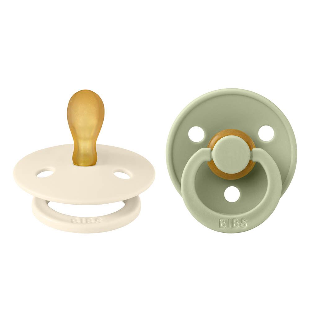 Twee fopspenen, kleuren Ivory en Salie. Symmetrische speen. Merk BIBS. Gele speen.