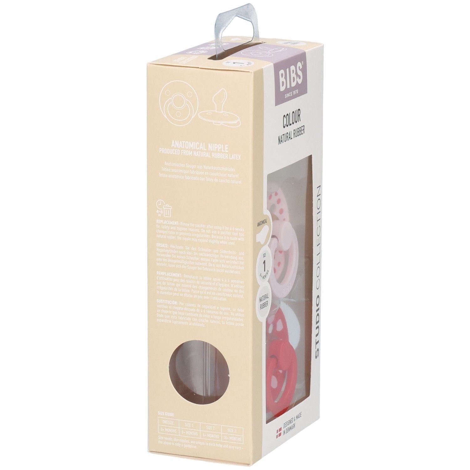 Verpakking met twee fopspenen. Venster toont rode en roze fopspenen. Merk BIBS. Anatomisch, natuurlijk rubber. Studio Collection.