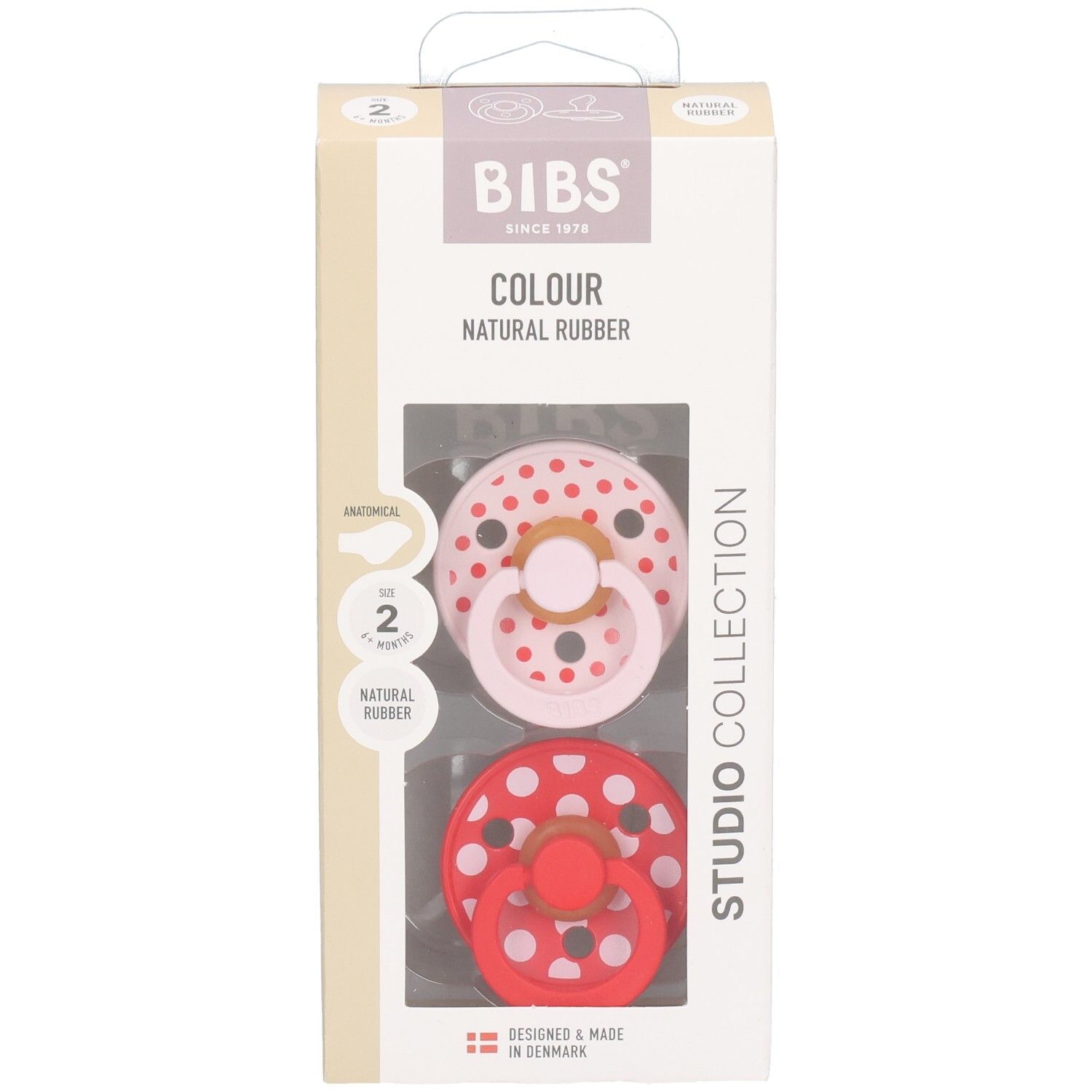 Verpakking met twee fopspenen. Roze en rode fopspeen met witte stippen. BIBS-logo en productinformatie.
