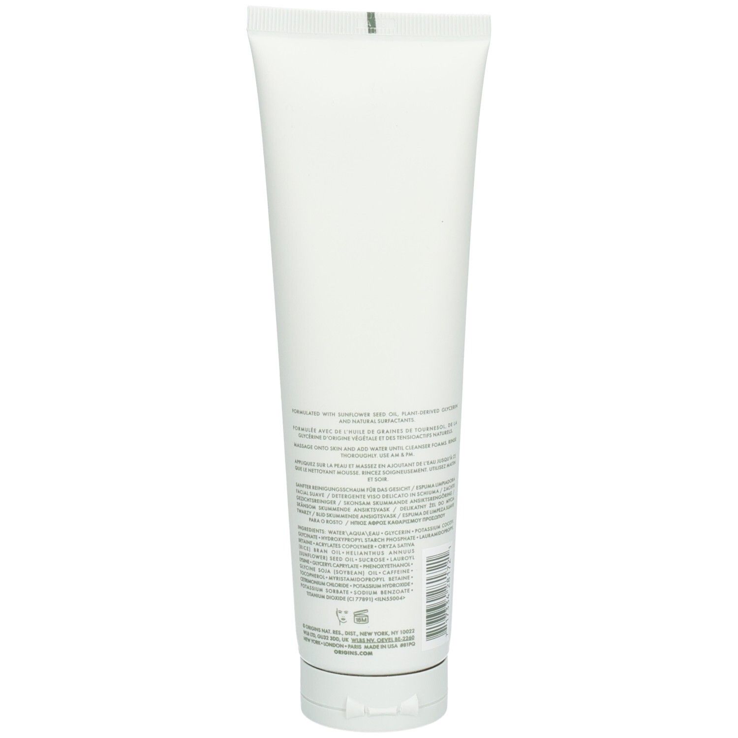 Dos d'un tube blanc. Contient du texte en plusieurs langues, dont l'anglais et le français. Code-barres présent.