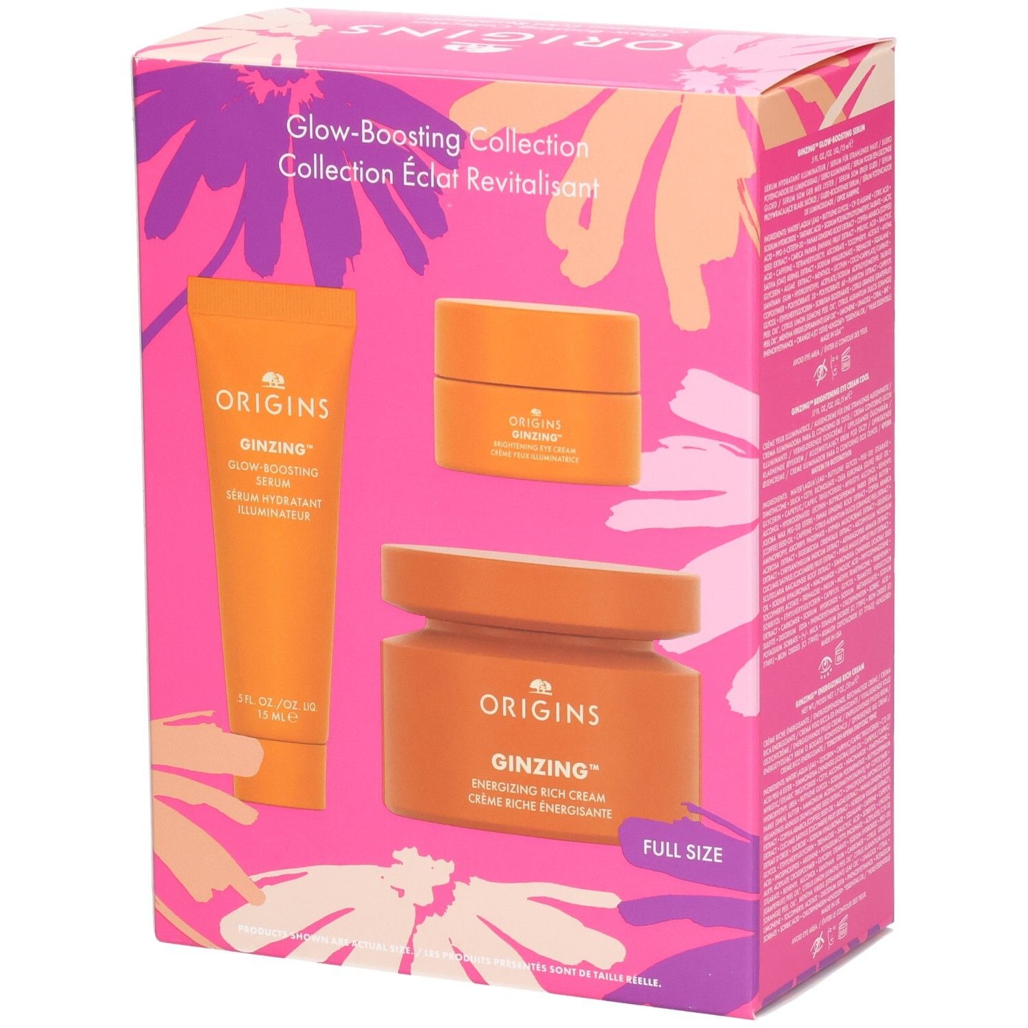 Cadeauset met drie oranje producten. Opschriften: Origins, Ginzing, Glow-Boosting Serum, Energizing Rich Cream. Verpakking met bloemenpatroon.