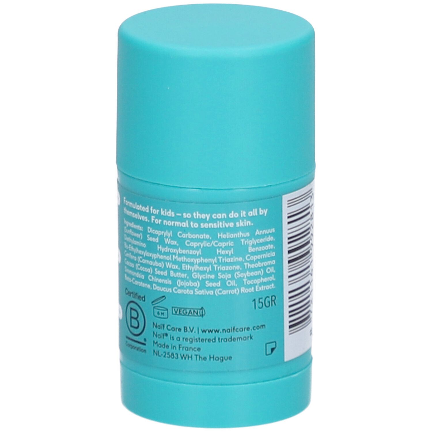 Turquoise zonnestick voor kinderen. Achterkant met ingrediënten en certificeringen. Vegan logo.