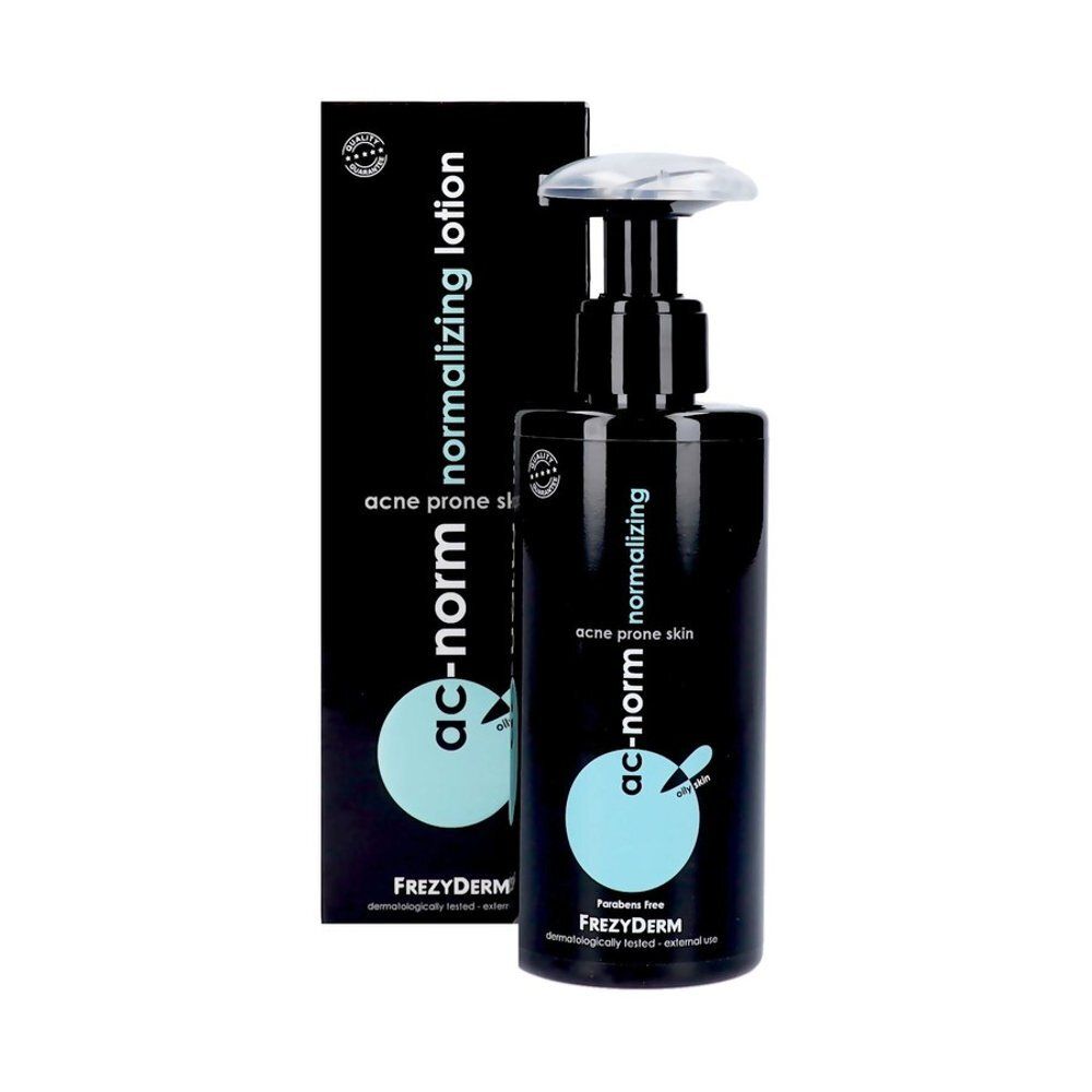 Frezyderm Ac-Norm Lotion: Zijaanzicht van de zwarte fles met pompdosering.