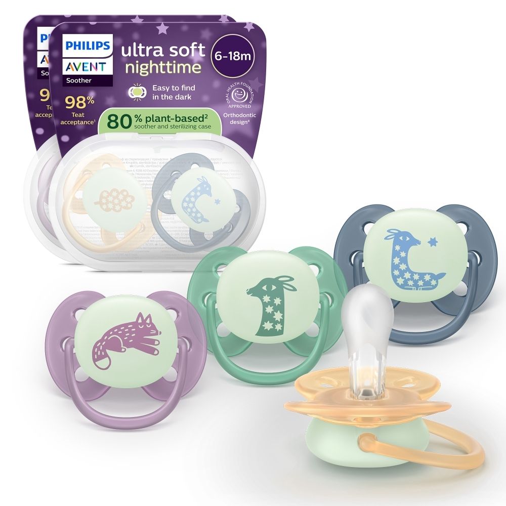 Verschillende Philips AVENT fopspenen, Night Time, in verschillende kleuren en designs. Verpakking op de achtergrond.