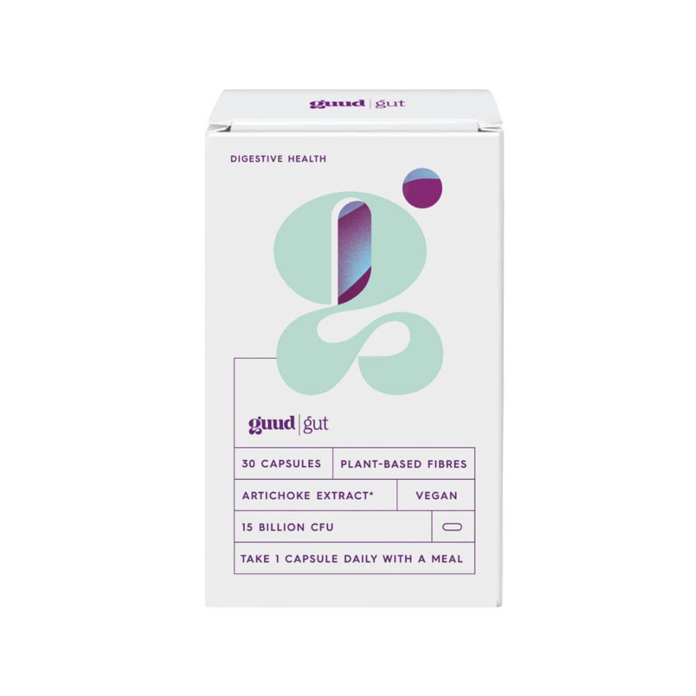 Witte doos met productopdruk. Opschrift: Guud Gut, 30 capsules, plantaardige vezels, artisjokextract, vegan, 15 miljard KVE.