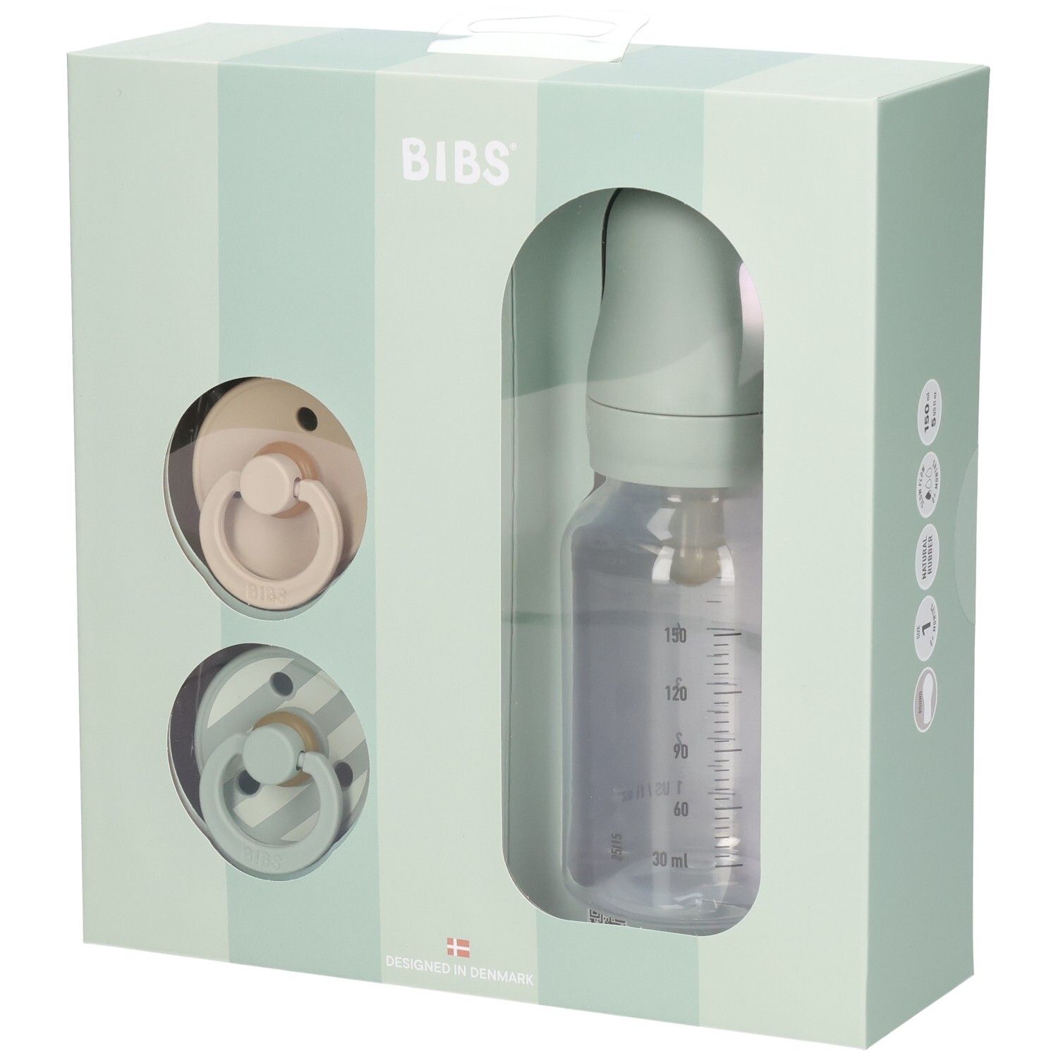 Cadeauset met twee fopspenen en een babyfles in een doos. De fles heeft een maatschaal.