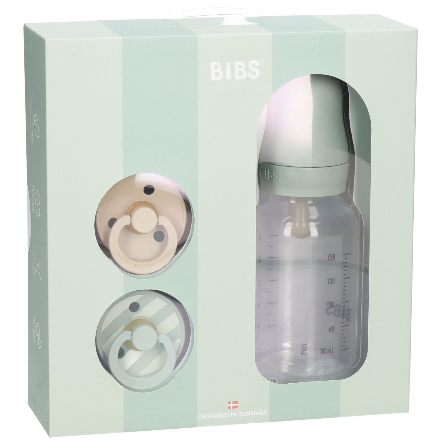 Cadeauset met twee fopspenen en een babyfles in een doos. De fles heeft een maatschaal.