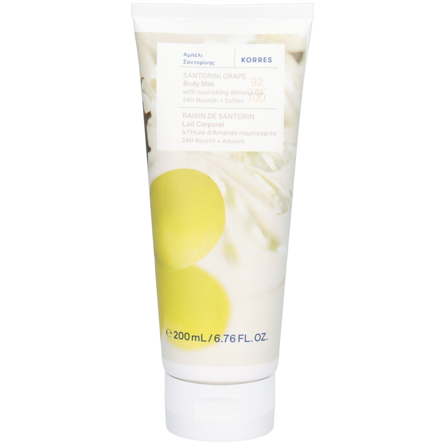 Tube Korres Santorini Grape Body Milk. Witte achtergrond, gele druiven. Tekst: 200ml. Merknaam Korres zichtbaar.