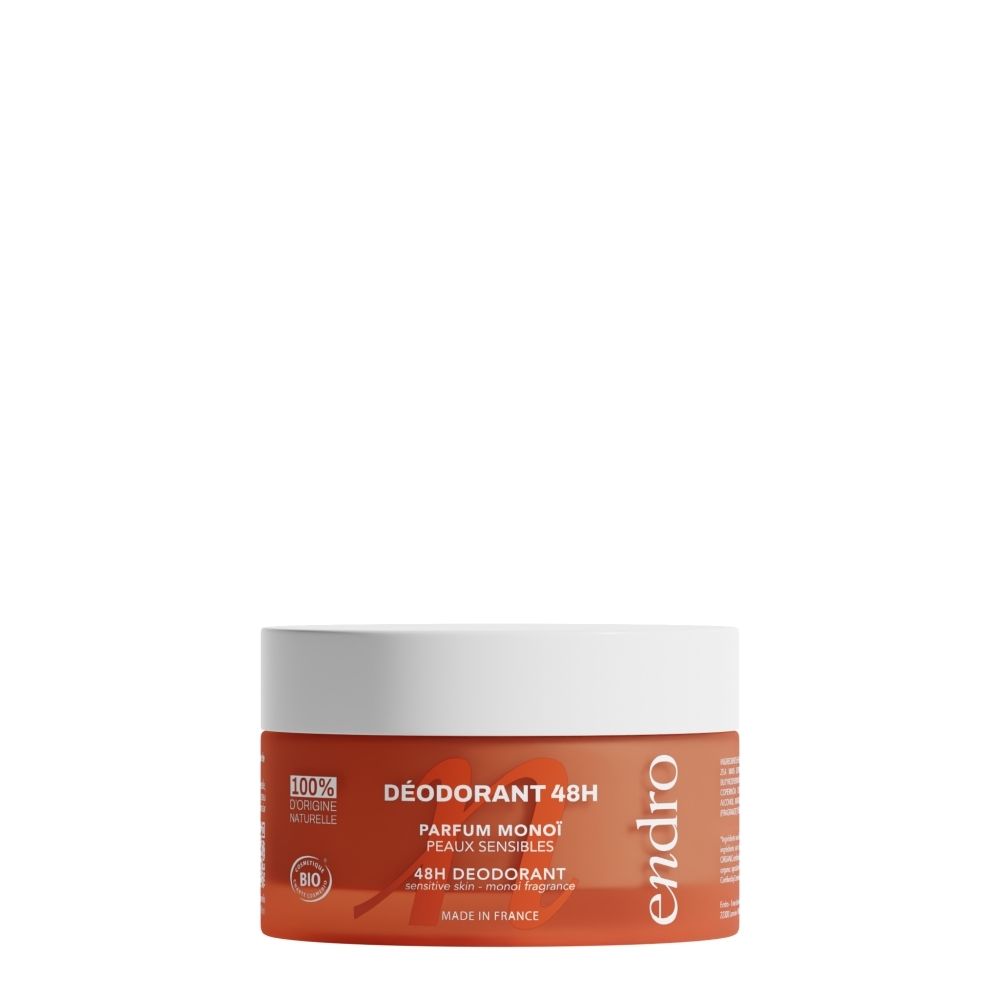 Pot orange avec couvercle blanc, déodorant 48h, parfum monoï, peaux sensibles.