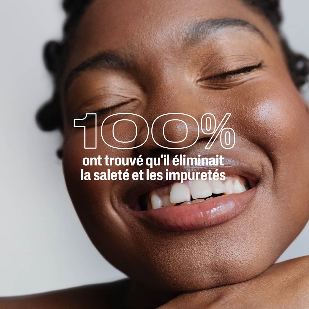 Femme souriante, 100% ont trouvé qu'il éliminait la saleté.