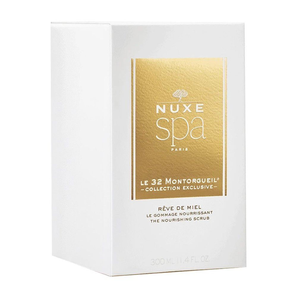 Witte doos met gouden plaat. Bevat Nuxe Spa Rêve de Miel The Nourishing Scrub, 300ml.