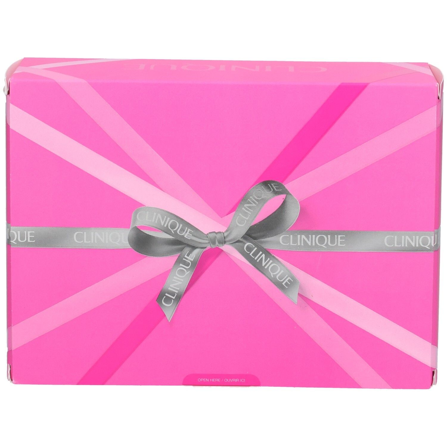 Boîte cadeau Clinique rose avec un nœud et un motif géométrique.
