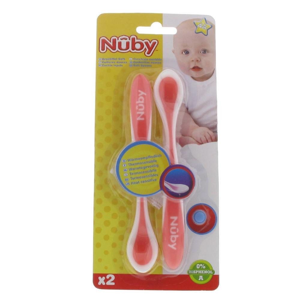 Twee roze en witte babythermische lepels in verpakking. Merk Nuby. Lepels veranderen van kleur bij hitte.