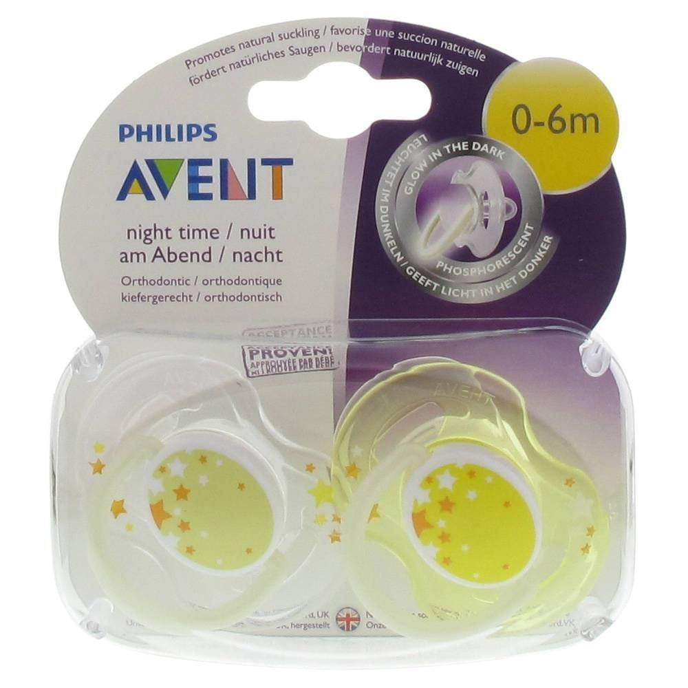 Twee gele fopspenen met sterren in verpakking. Merk Philips Avent, voor 0-6 maanden. Licht op in het donker.