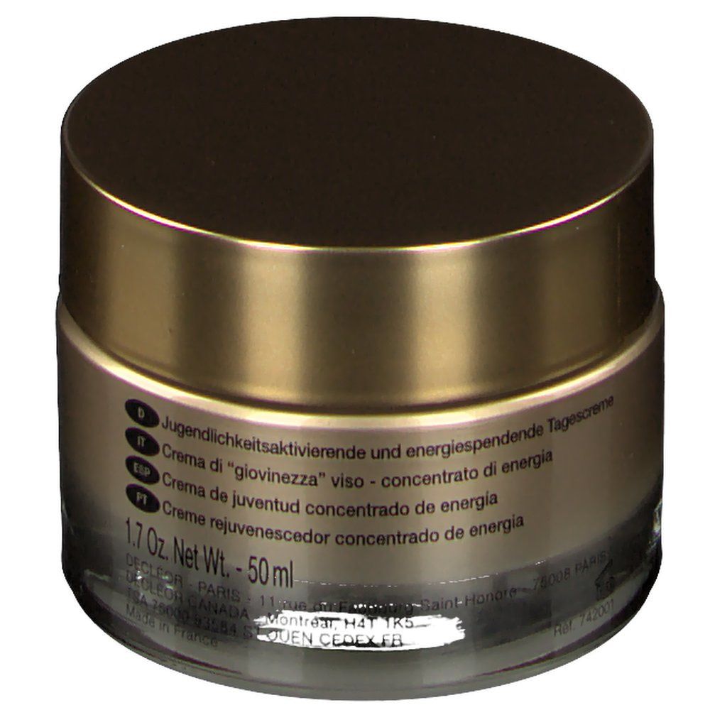 Pot de crème avec couvercle doré. Inscription : Crème de jeunesse concentré d'énergie. 1.7 Oz. Net Wt. 50 ml.