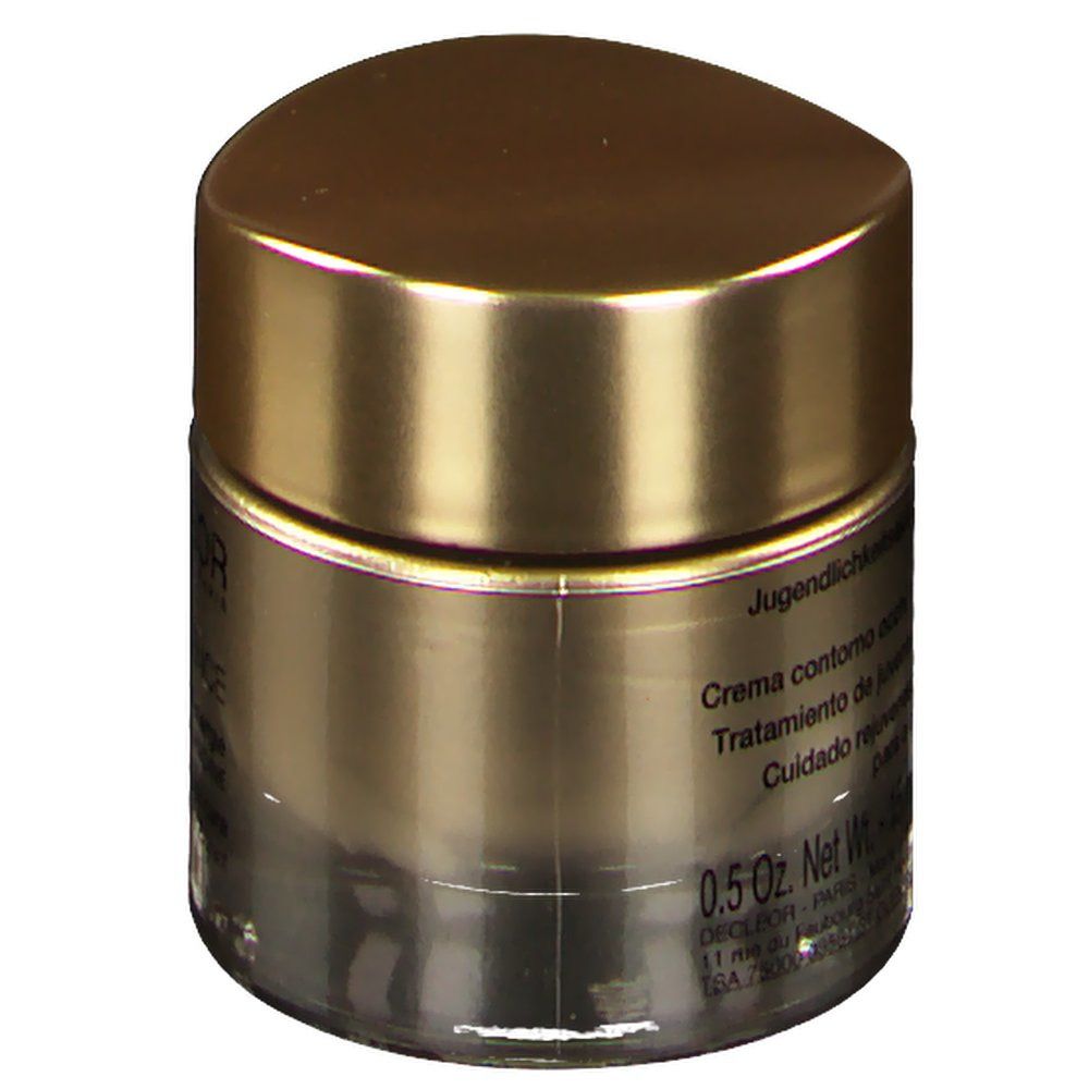 Pot doré avec couvercle. Inscription: 0.5 Oz. Net Wt. Informations produit en plusieurs langues.