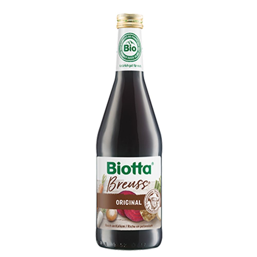 Biotta Breuss Original. Bouteille en verre brun. Logo bio. Légumes illustrés. Bouchon doré. Étiquette.