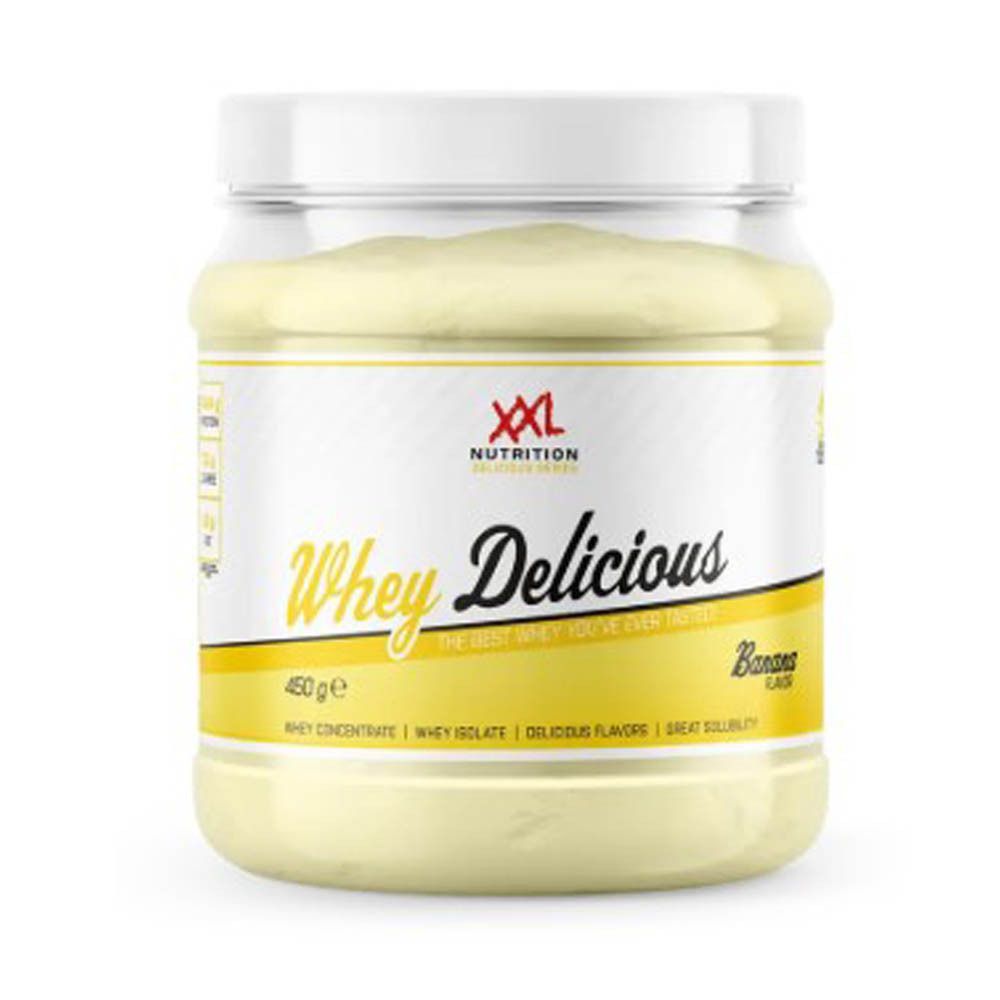XXL Nutrition Whey Delicious Banaan: Transparante pot met witte deksel, gevuld met bananen whey poeder. Label met gouden opdruk.