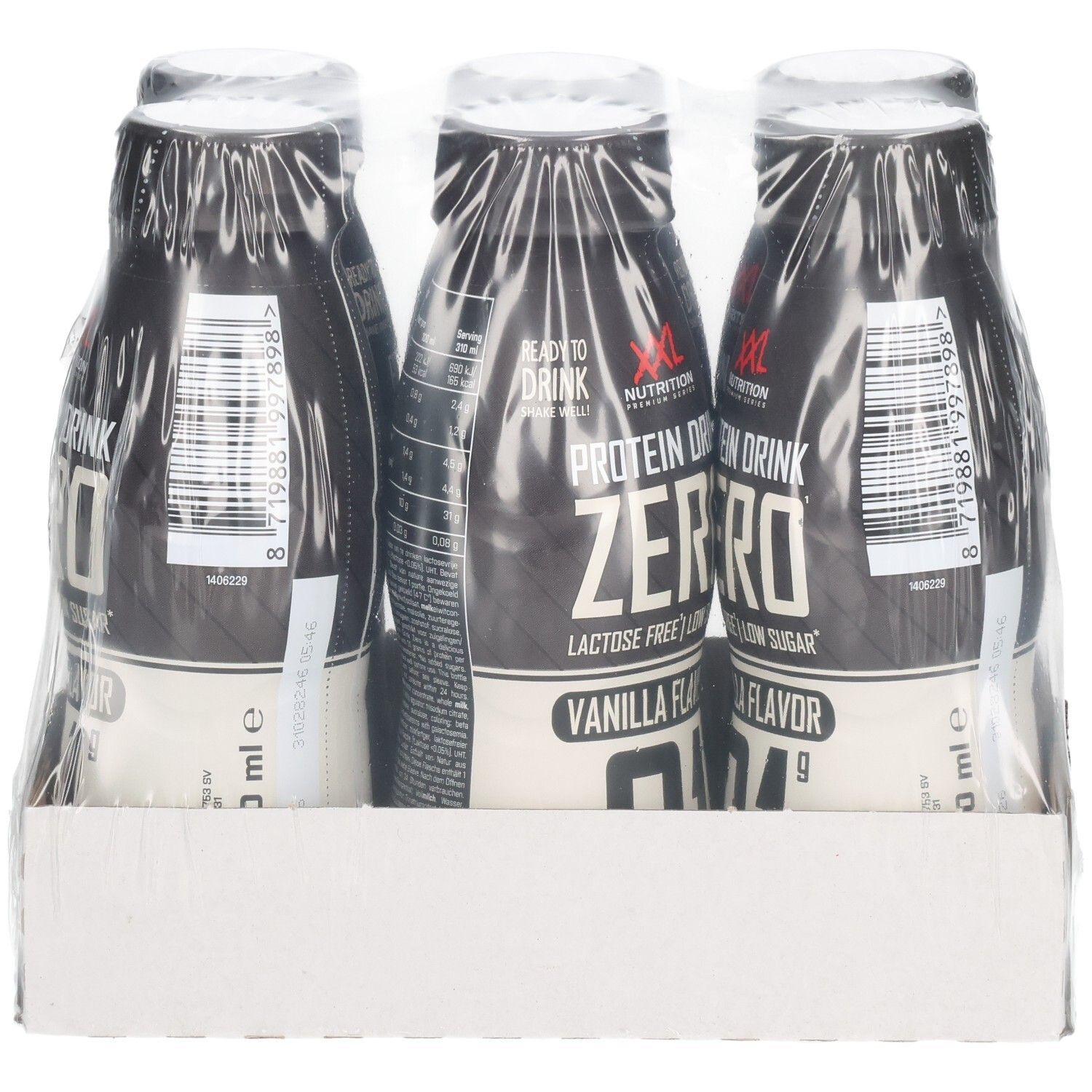 Trois bouteilles de XXL Nutrition Protein Drink Zero, saveur vanille, emballées sous film plastique. Sur carton.