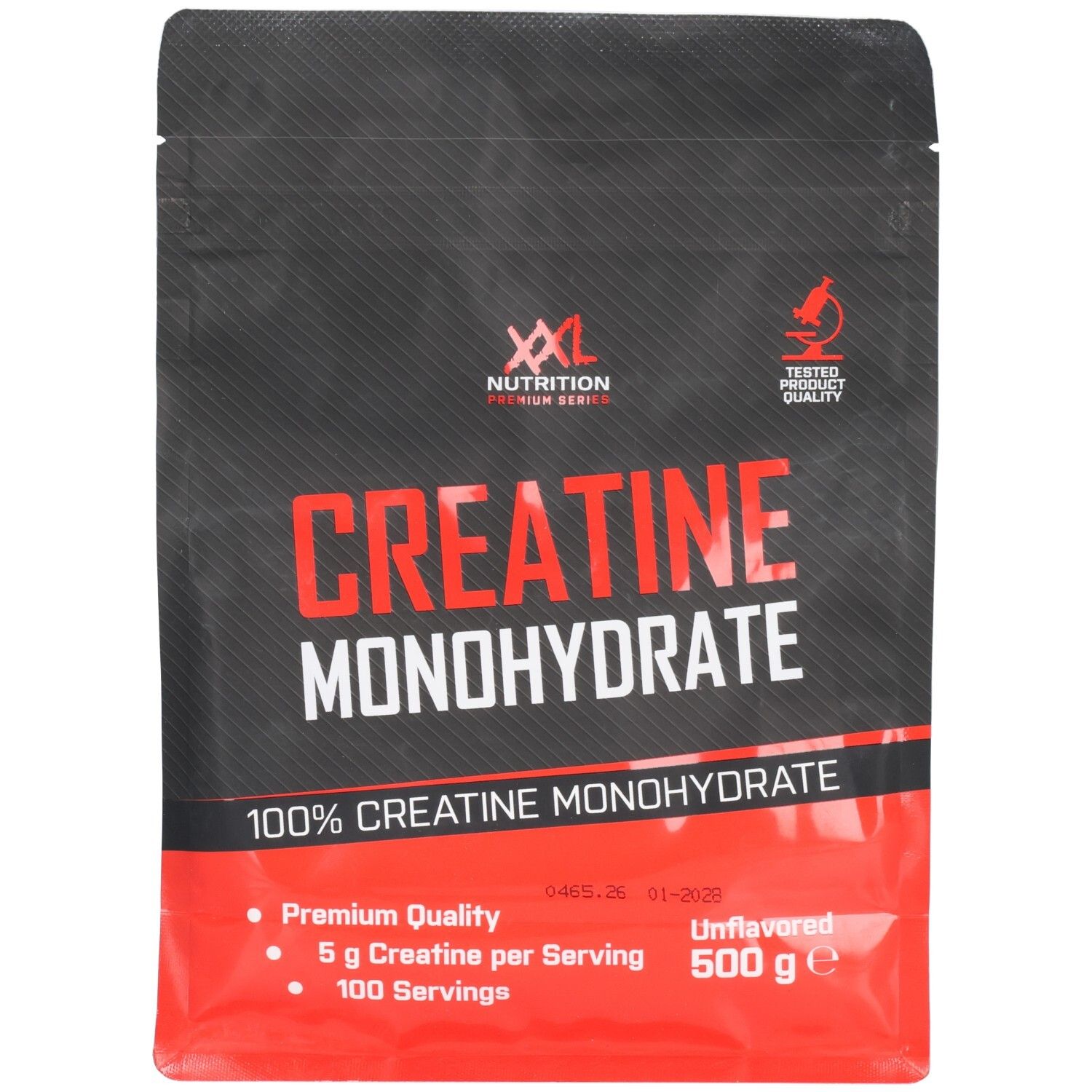 Zwarte verpakking met rode streep. Opschrift "Creatine Monohydrate". Bevat 500 g. Merk: XXL Nutrition. "100% Creatine Monohydrate".
