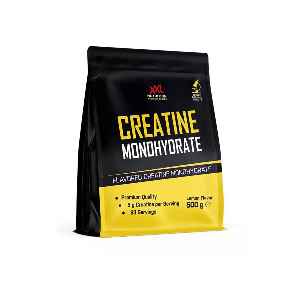 Zwarte verpakking met geel etiket. 'Creatine Monohydrate' en 'XXL Nutrition' zichtbaar. 500 g, citroensmaak.