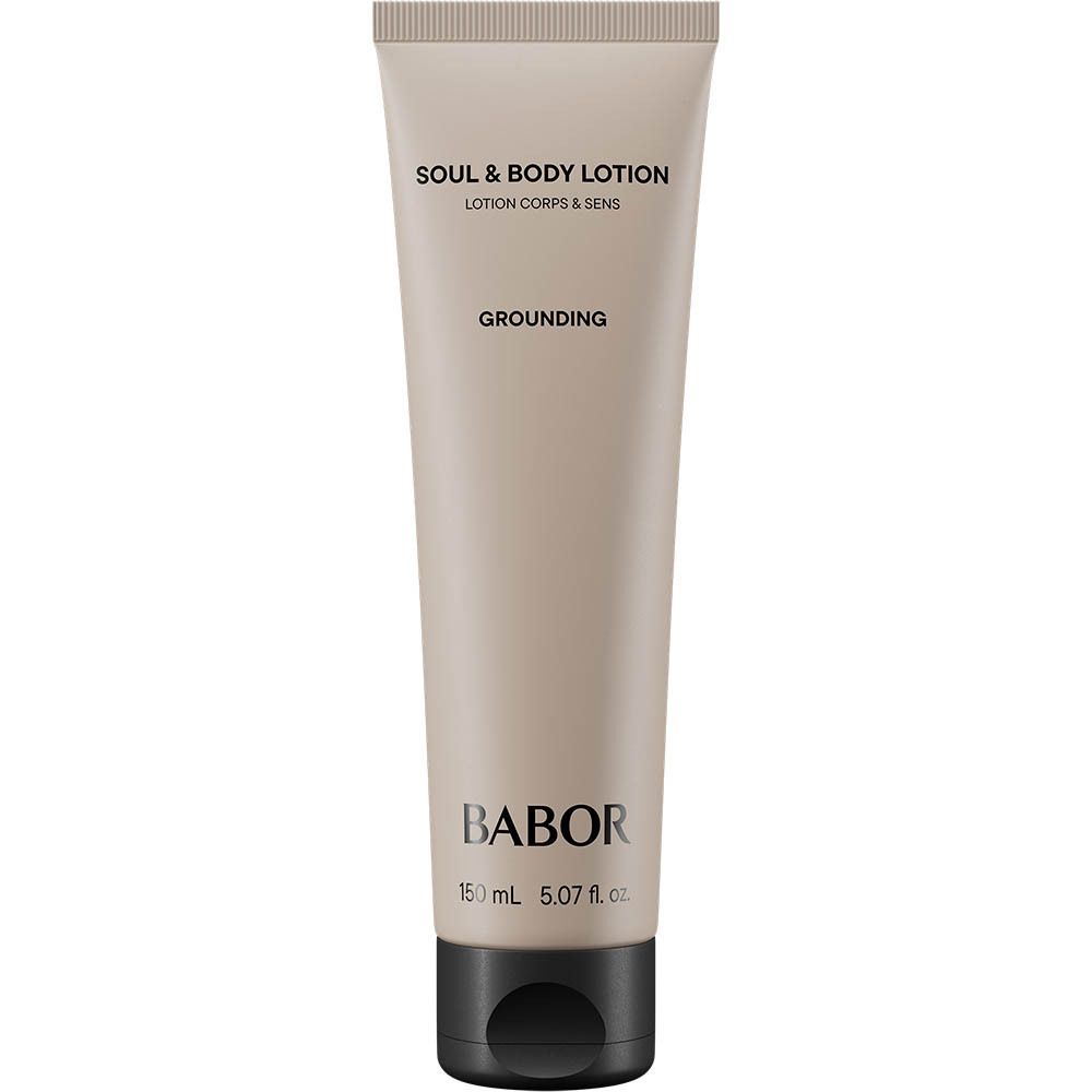 Tube beige avec bouchon noir. Inscription: Soul & Body Lotion, Grounding, Babor. En bas: 150 ml, 5.07 fl. oz.