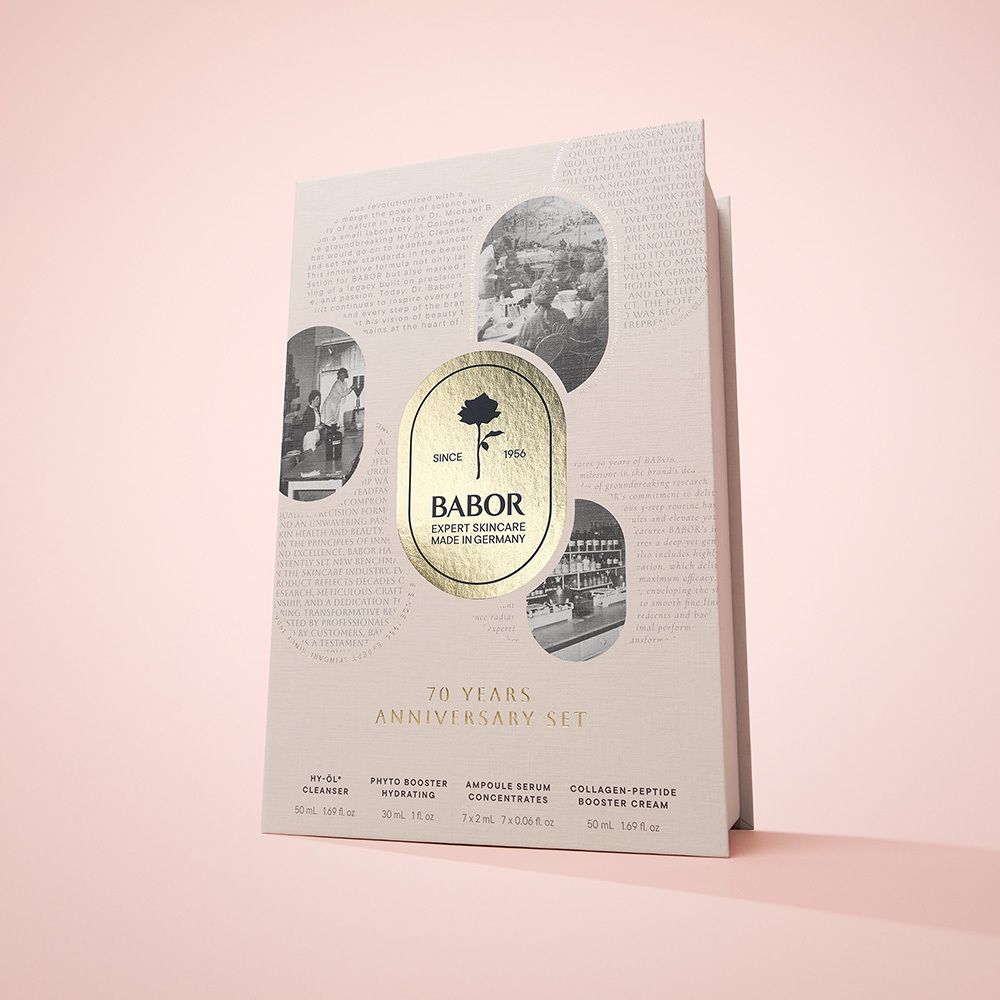 Coffret cadeau ouvert avec produits. Contient flacons, ampoules et crème. Marque BABOR.