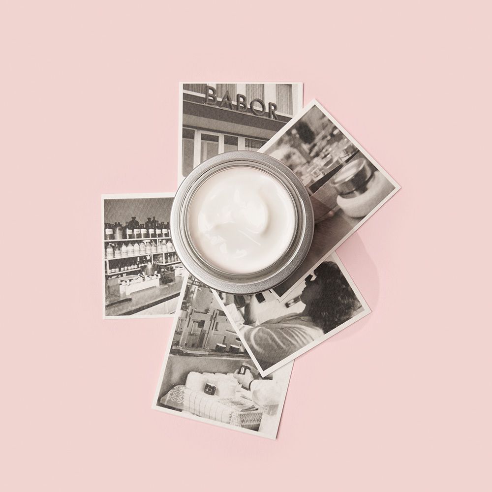 Pot de crème avec inscription DOCTOR BABOR. Photos en arrière-plan.