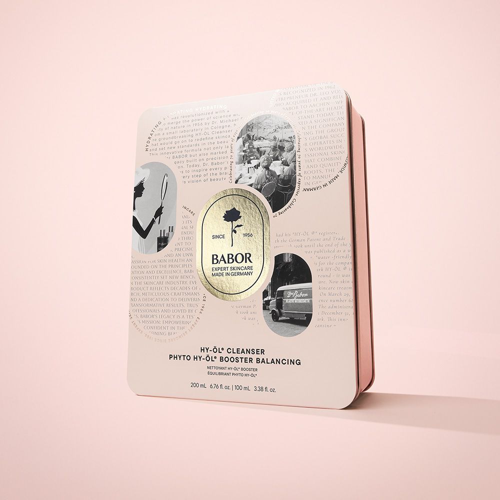 Meerdere metalen dozen naast elkaar. Logo met roos en tekst BABOR. Tekst: HY-ÖL® Cleanser, Phyto HY-ÖL® Booster Balancing.