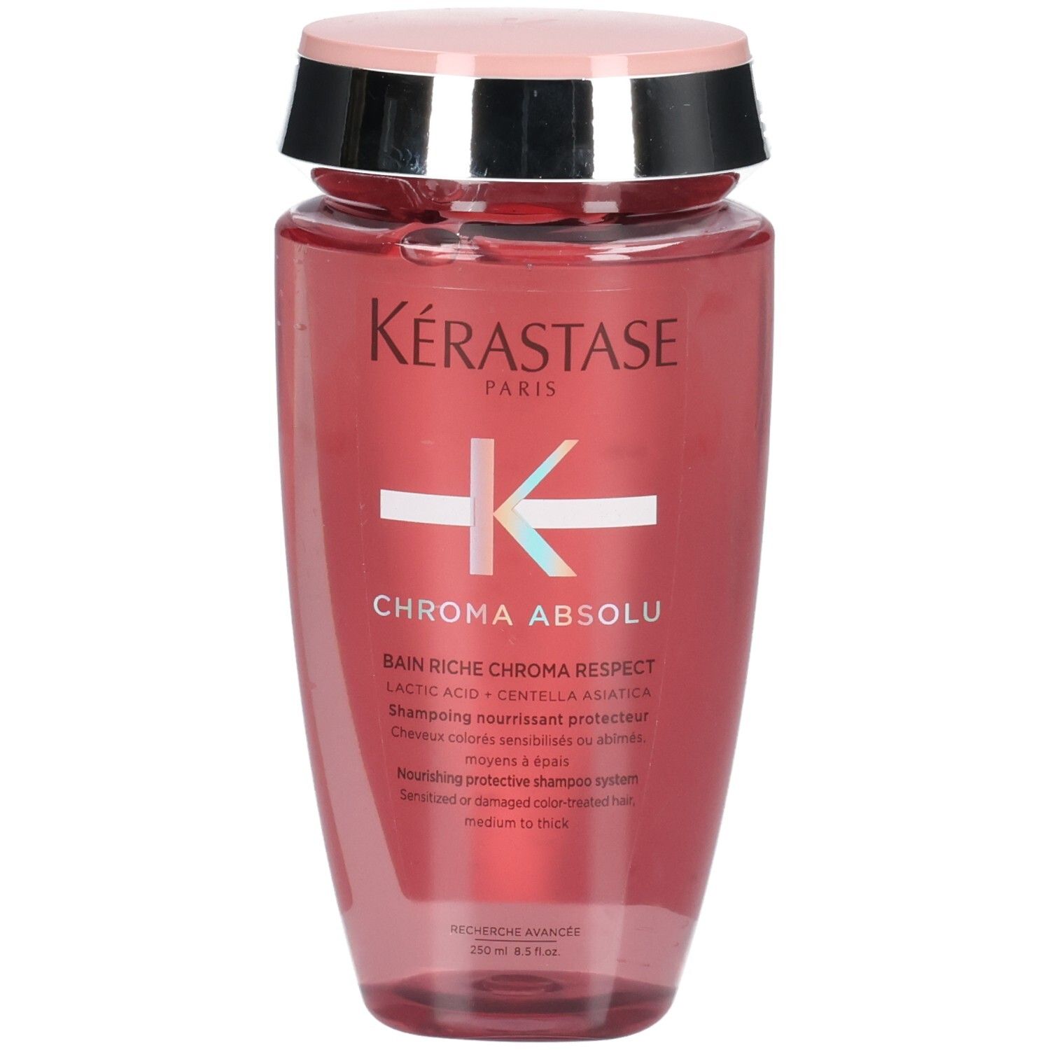 Kérastase Chroma Absolu Bain Riche Chroma Respect shampoofles, roze, met zilverkleurige en roze dop.