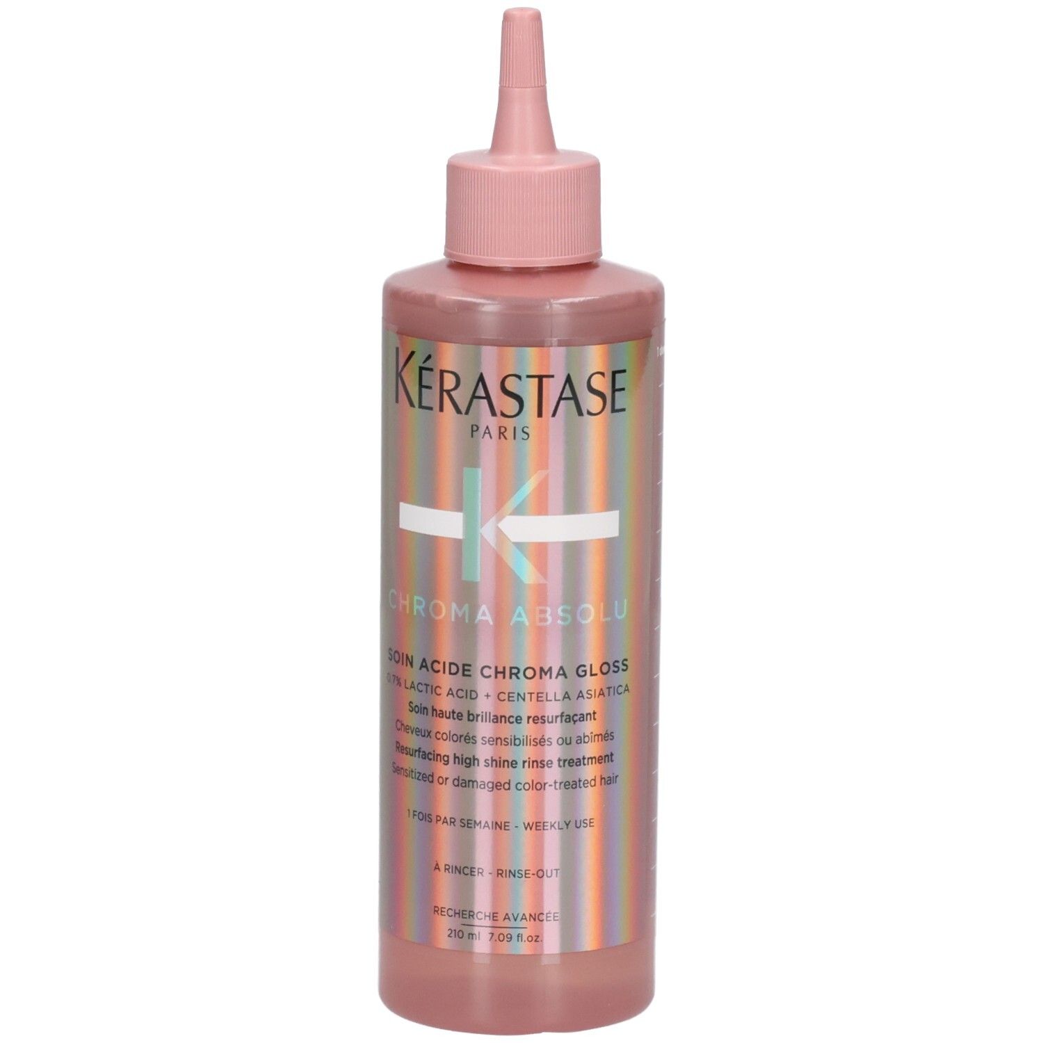 Bouteille Kérastase Chroma Absolu avec applicateur rose. Rayures brillantes sur l'étiquette.
