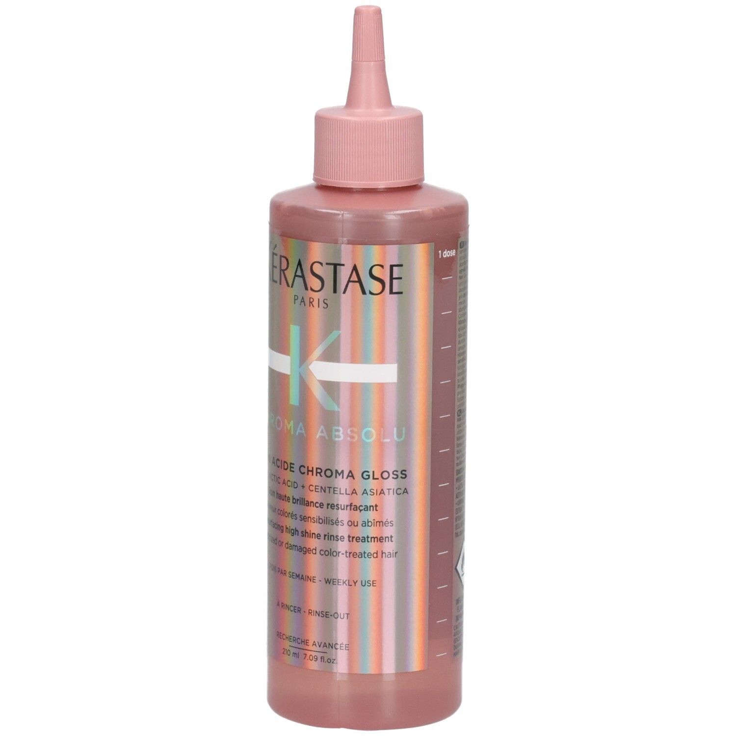 Bouteille Kérastase Chroma Absolu avec applicateur rose et étiquette à rayures.