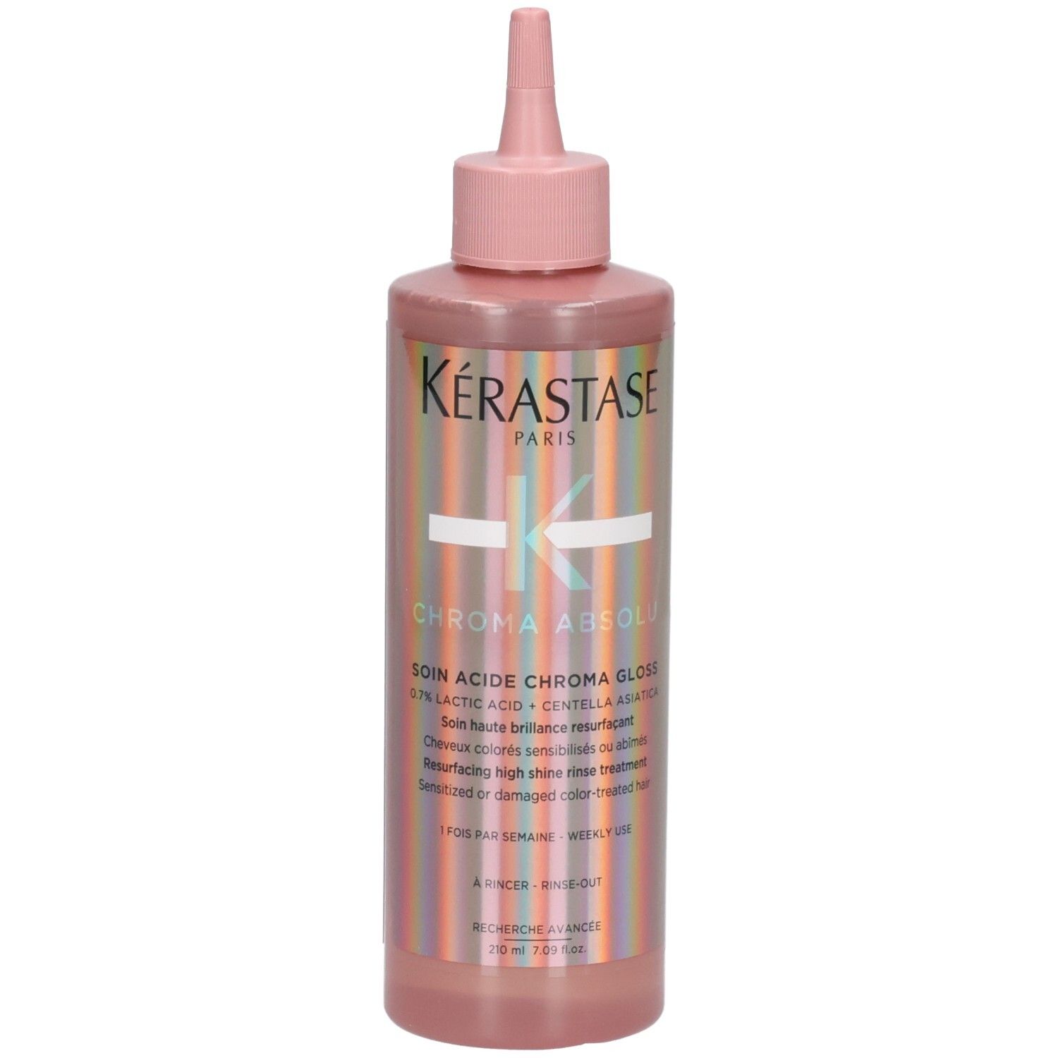 Bouteille Kérastase Chroma Absolu avec applicateur rose et étiquette à rayures.