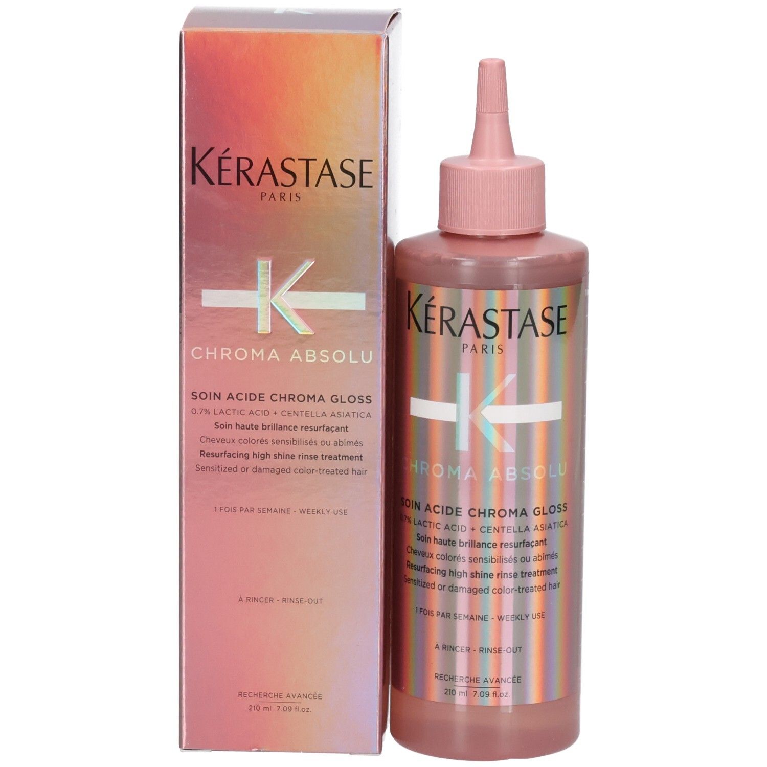Bouteille et boîte Kérastase Chroma Absolu avec rayures roses et oranges.