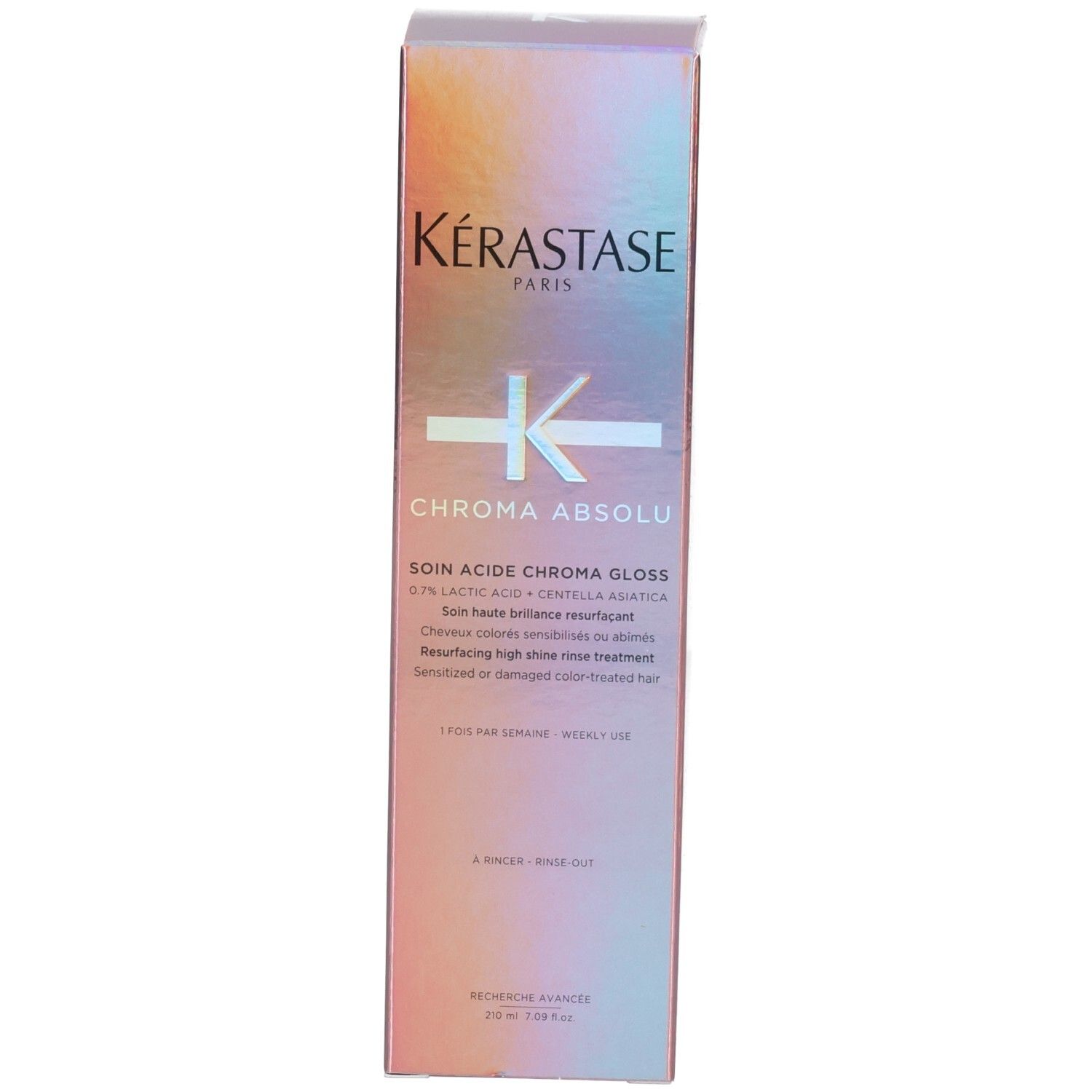 Boîte Kérastase Chroma Absolu avec rayures roses et oranges.