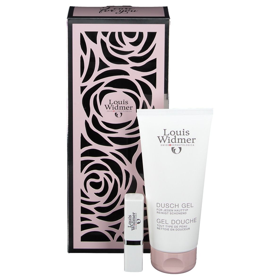 Coffret cadeau Louis Widmer avec gel douche et stick à lèvres. Emballage avec motif de roses et logo. Tube de gel douche blanc et stick à lèvres.