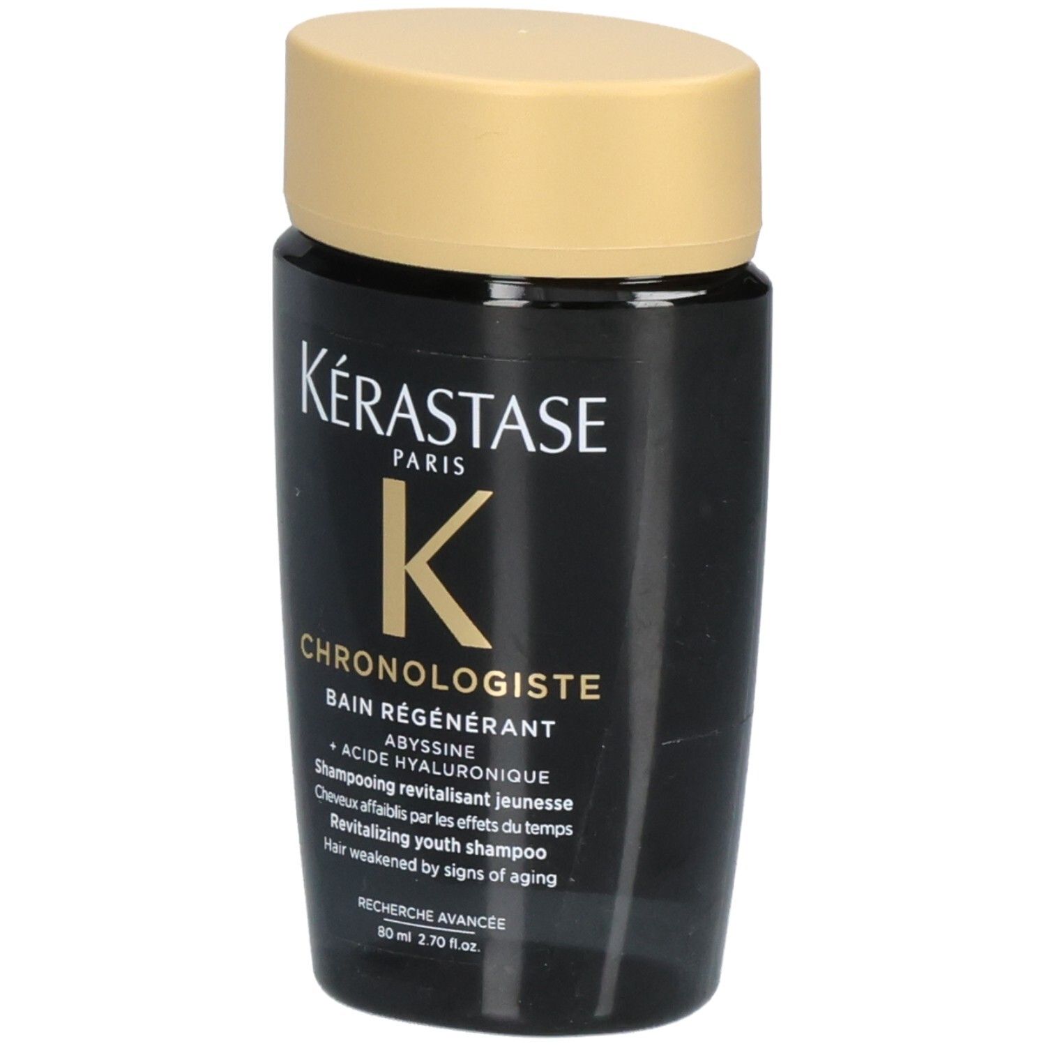 Kérastase Chronologiste Bain Régénérant revitaliserende jeugdsjampoe in een zwarte fles met gouden dop.